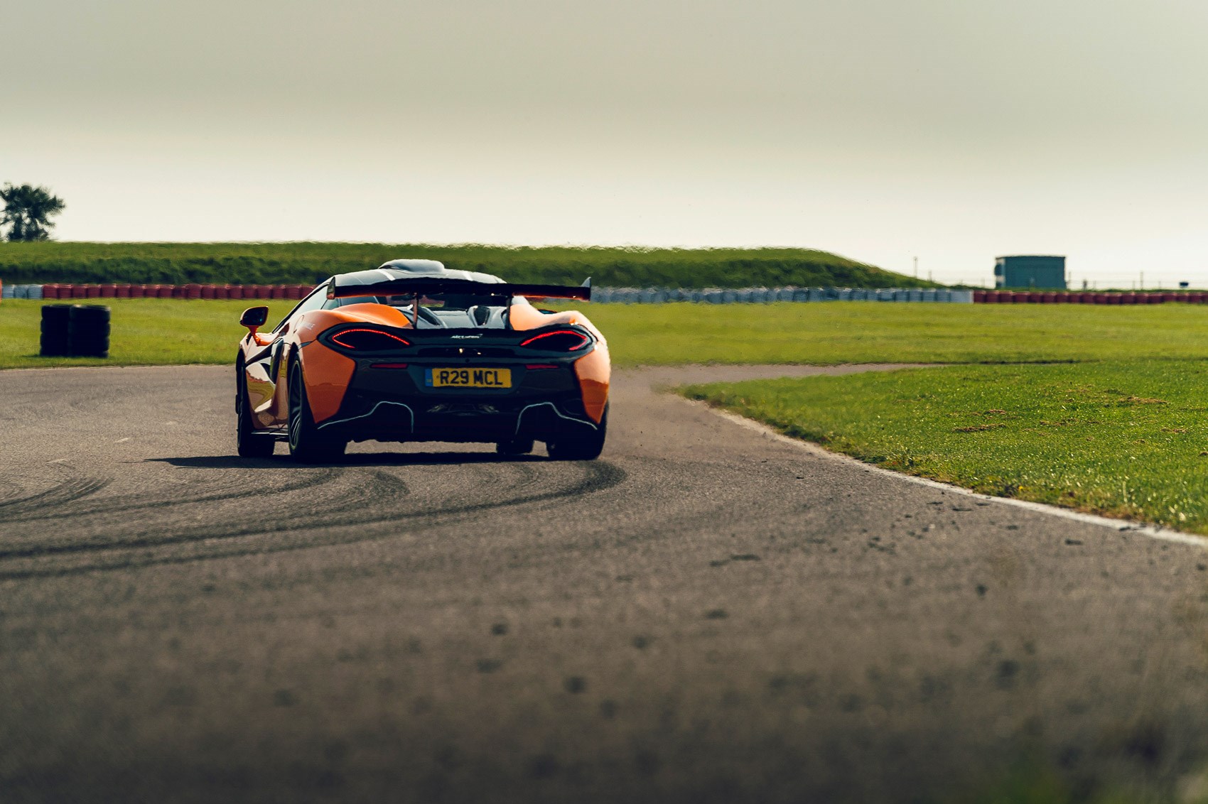 McLaren driving on Track